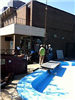 Workers Removing Old Equipment From the Recreation Center